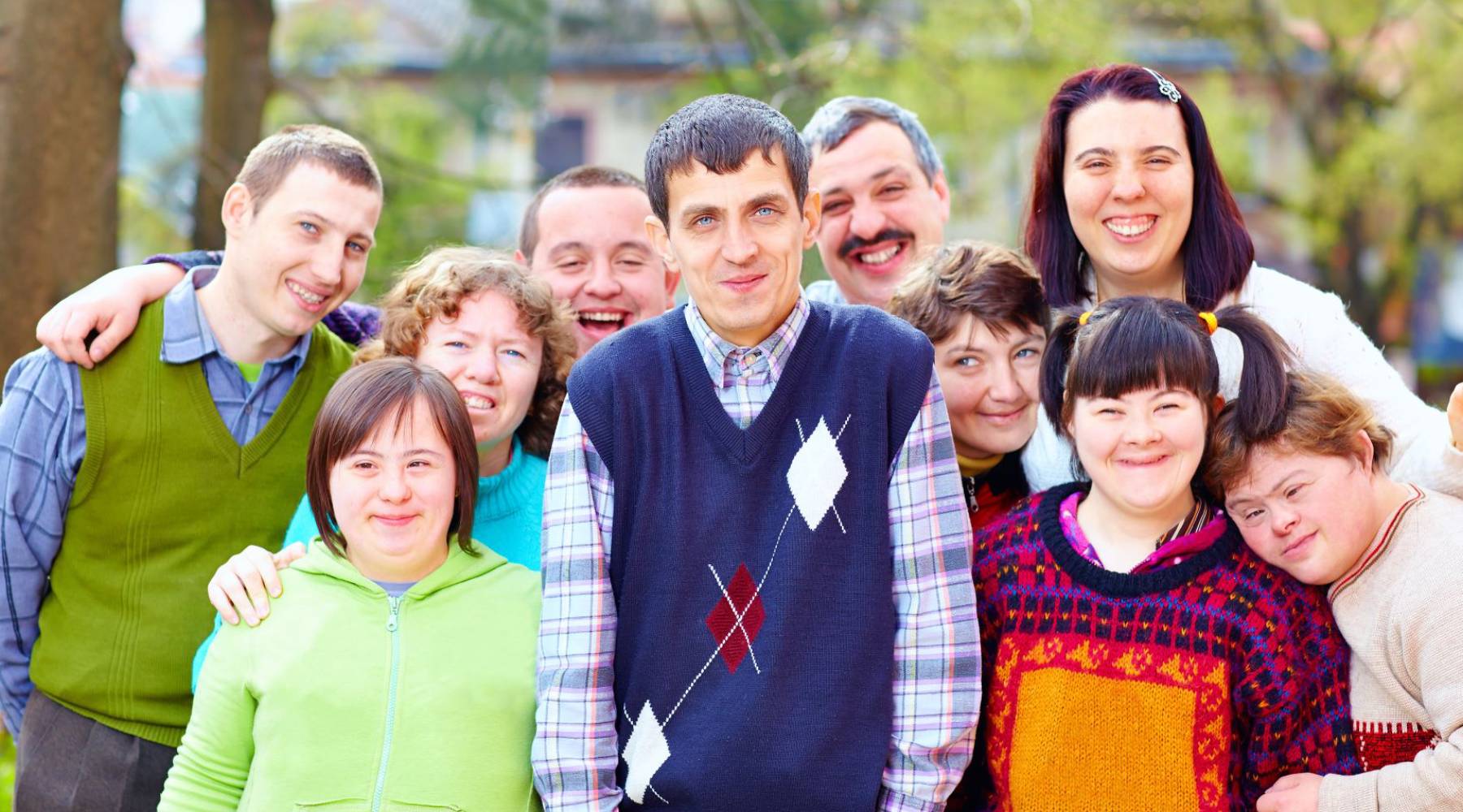 group of happy people with disabilities